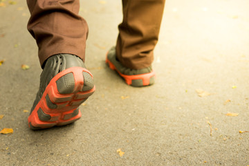 One is walking in evening light
