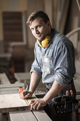 Skilled carpenter in workshop