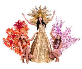 three carnival dancer women dancing against isolated white