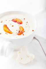 Cauliflower soup with bloody oranges fillets. Healthy food. 