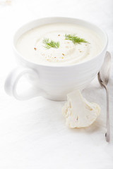 Cauliflower soup with dill and seasoning. Healthy food