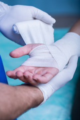 Fototapeta na wymiar Strapping patient's arm