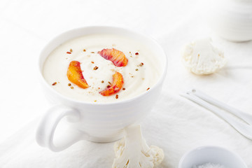 Cauliflower soup with bloody oranges fillets. Healthy food. 