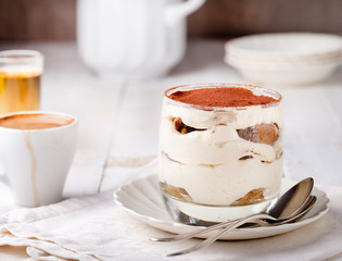 Tiramisu dessert in a glass. Traditional Italian.