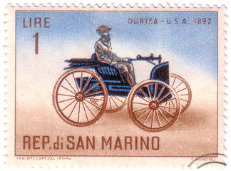 SAN MARINO - CIRCA 1962: A stamp printed in San Marino shows Old auto with the inscription 