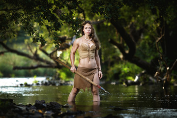 wild amazonian hunter hunting in a river