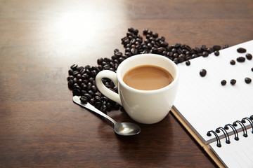 Cup of coffee with book