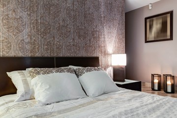 Posh bedroom with elegant walpaper