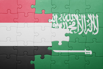 Fototapeta premium puzzle with the national flag of saudi arabia and yemen