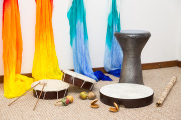 Traditional instruments on the floor.