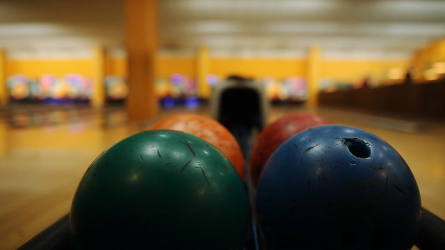 bowling ball rolls to the other balls
