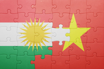 puzzle with the national flag of vietnam and kurdistan