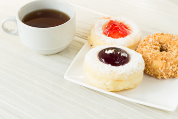 fresh baked donuts and tea