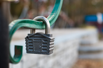 Padlock in form of house