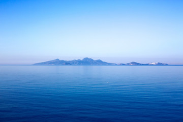 Nisyros volcano on the horizon in the morning