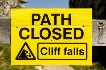Fototapeta premium Path Closed, Cliff Falls sign.
