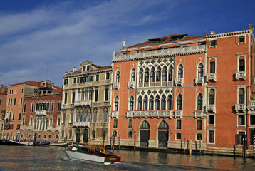 Fototapeta na wymiar VENICE, ITALY - SEPTEMBER 02, 2012: Old typical buildings on Grand Canal, Venice, Italy