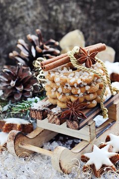 Christmas cookies and decoration on a rustic wooden table.Selective focus.