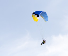 parachute flying in the sky