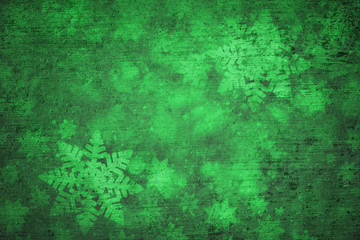 Magical grunge green colored shiny abstract blurry textured snowflake shapes illustration...