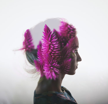 Creative double exposure with portrait of young girl and flowers