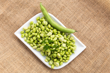 Fresh beans on sackcloth