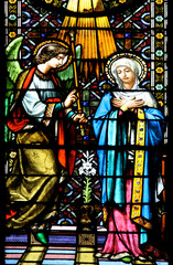 Beautiful stained glass window from Santa Maria de Montserrat Abbey (Catalonia, Spain) depicting St.Gabriel who announces the Blessed Virgin Mary God's plan for her to be the Mother of His Son, Jesus.