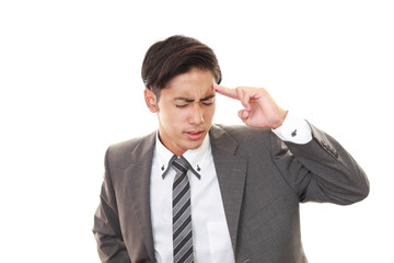 頭痛を訴える男性