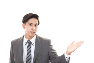 案内するビジネスマン