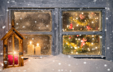 Lantern on window sill in winter