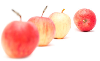 Four apples on a white background
