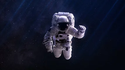 Fotobehang Astronaut in de ruimte. Elementen van deze afbeelding geleverd door NASA © Vadimsadovski
