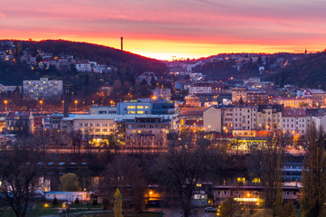 Fototapeta na wymiar View to the night small district in big city Prague at blue hour, Czech Republic.