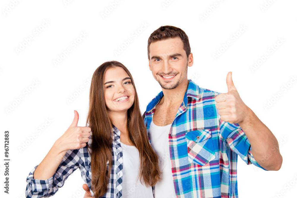 Sticker happy cute couple in love embracing each other showing thumbs up