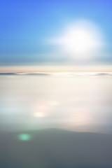 Motion blur (special effect) sky, sun and clouds