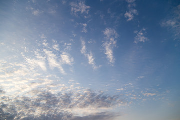 Naklejka na ściany i meble beautiful clouds dawn sun as background