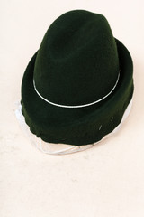 felt hood fixed on wooden hat-block for shaping