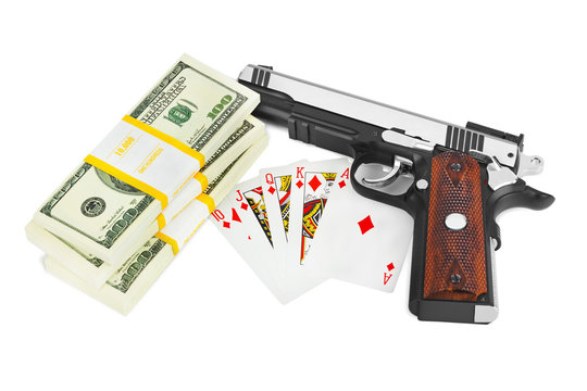 Gun money and playing cards