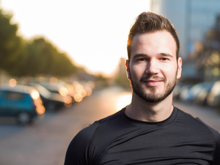 Portrait Of Male Runner On Urban Street