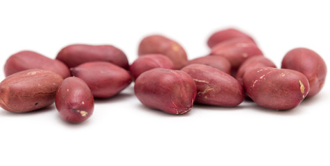 Peanuts on a white background. close