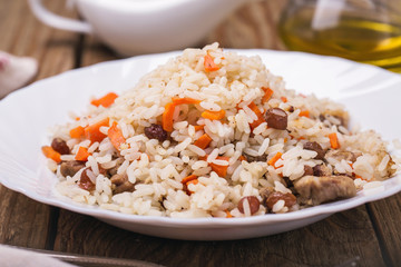 Plate of freshly prepared pilaf, closeup