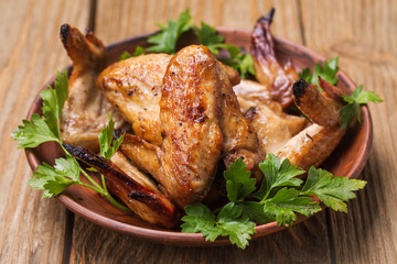 Plate with baked chicken wings