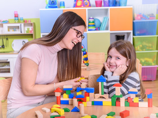 Mother and Daughter Playing Together