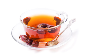 Cup of tea from a dogrose isolated on a white background