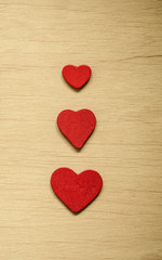 Obraz na płótnie Canvas Valentine's day background. Red decorative hearts