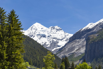 Panorama view of the Alps and Bluemlisalp on the hiking path near Kandersteg, Switzerland