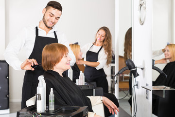 Barber makes the cut for  woman