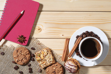 Background with coffee, cookies and notepad
