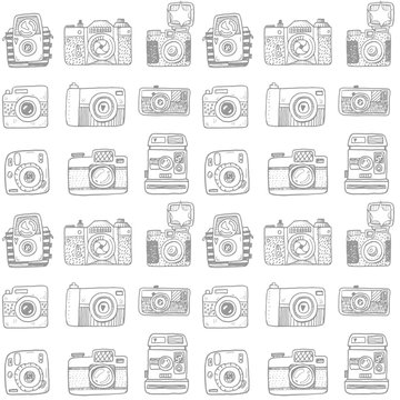 Seamless pattern with hand drawn retro cameras