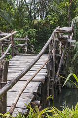 wooden pedestrian bridge across the river